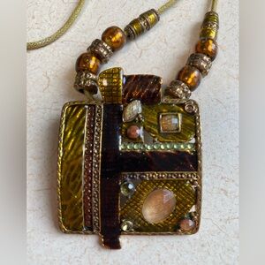 Retro Ikita Brown Red Gold Tone Enamel Pendant on a cord
Necklace